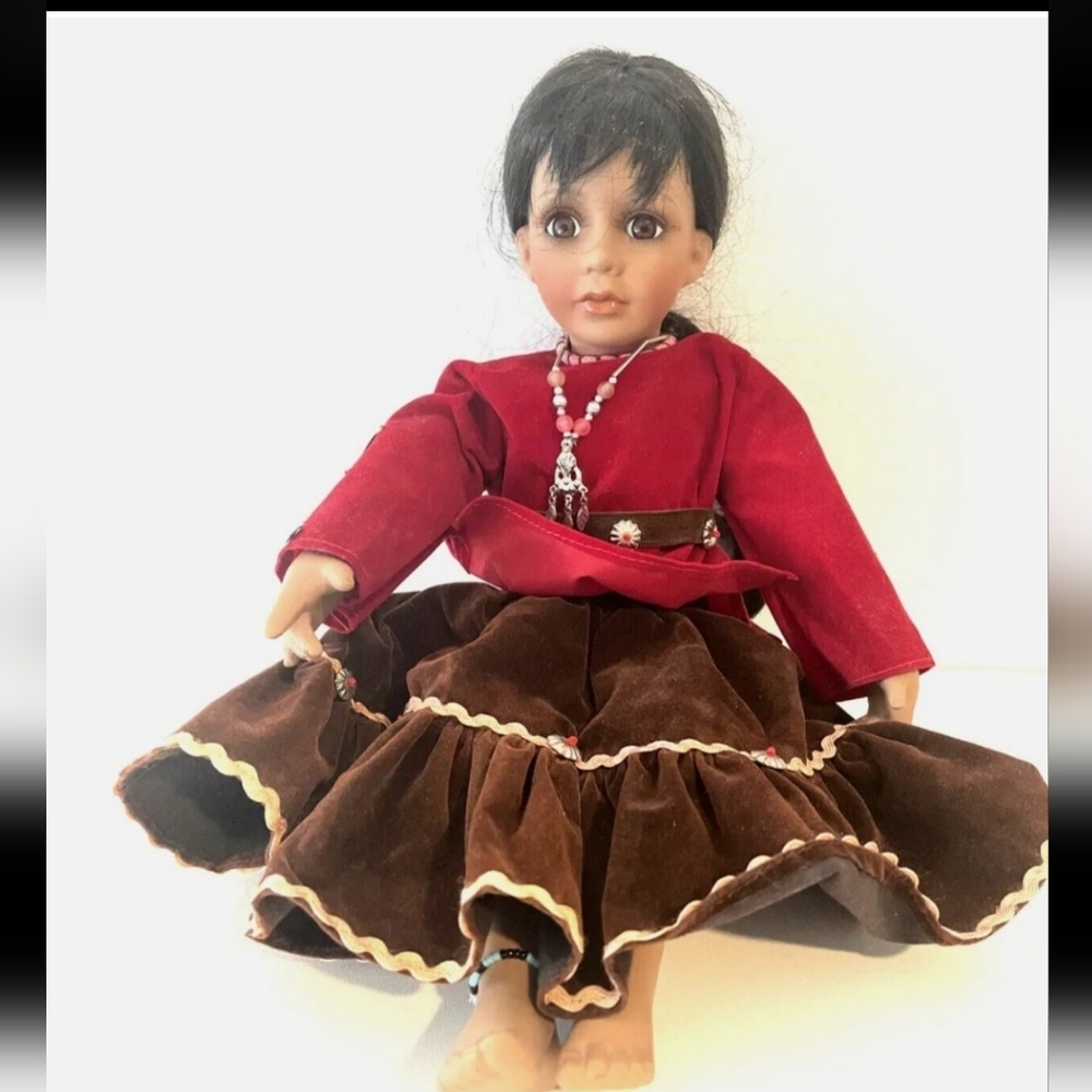New In Box!! Navajo Porcelain Doll with pottery piece